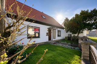 Einfamilienhaus kaufen in 39240 Groß Rosenburg, Behagliches Einfamilienhaus mit Balkon, Kamin & Nebengebäude - perfekt für ruhiges, zentrales Wohnen