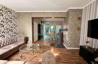 Haus kaufen in 46397 Bocholt, Modernisiertes Reihenendhaus mit Einliegerwohnung, Garage und Garten in Bocholt