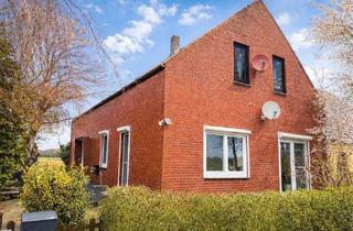 Wohnung kaufen in 28844 Weyhe, Weyhe - Eigentumswohnung mit Garten & Doppelhaus Charakter in ruhiger Lage