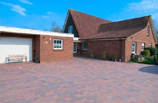 Haus kaufen in 26624 Südbrookmerland, Südbrookmerland - Modernisiertes Wohnhaus mit Einliegerwohnung in ruhiger Alleinlag