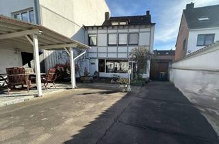 Einfamilienhaus kaufen in 52355 Düren, Düren - Wohnhaus mit Ladenlokal, Garagen und Lagerhalle