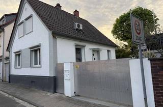 Haus kaufen in Wilhelmstraße, 63512 Hainburg, Modernisiertes, freistehendes EFH mit geräumiger Garage, Nebengebäude und familienfreundlichem Hof