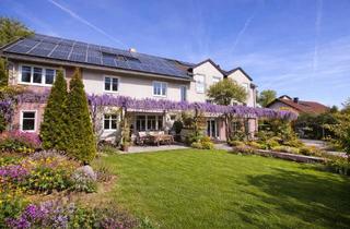 Haus kaufen in 63773 Goldbach, Familientraum mit Mieteinnahmen – Hochwertiges MFH mit 4 Einheiten und Top-Energieeffizienz