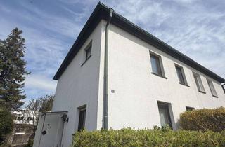 Doppelhaushälfte kaufen in 38820 Halberstadt, Charmante Doppelhaushälfte mit Entwicklungspotenzial und großzügigem Garten in Halberstadt