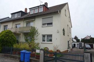Haus kaufen in 65462 Ginsheim-Gustavsburg, Voll vermietetes Drei-Familienhaus mit zusätzlicher Lagerfläche