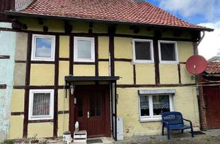 Doppelhaushälfte kaufen in 31036 Eime, Sanierungsbedürftige Doppelhaushälfte mit großem Grundstück und Nebengebäude