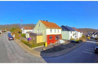 Einfamilienhaus kaufen in 66299 Friedrichsthal, Freistehendes 1-2 Familienhaus mit ehemaliger Gewerbeeinheit in ruhiger Lage von Friedrichsthal