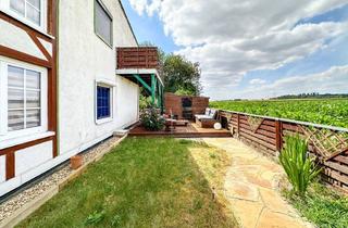 Wohnung kaufen in 50181 Bedburg, Wohngefühl wie im eigenen Haus – Eigentumswohnung mit Kamin, Garten & 2 Balkonen in Bedburg-Rath