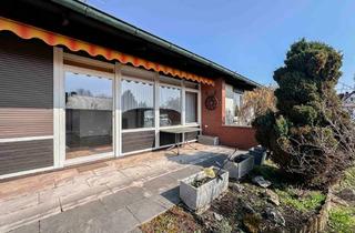Haus kaufen in 91353 Hausen, Bungalow-Stil mit großzügigem Keller und Einliegerpotenzial auf sonnigem Grundstück
