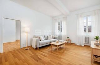 Wohnung kaufen in 86150 Augsburg, Wohnen unter hohen Decken – Altstadtwohnung mit Charakter im Apothekergäßchen