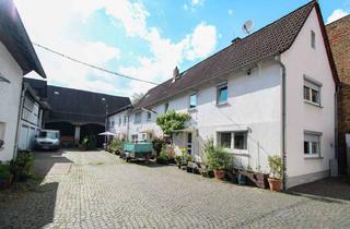 Mehrfamilienhaus kaufen in 65835 Liederbach, Mehrfamilienhaus mit 6 Garagen & Scheune – vielseitige Kapitalanlage in Liederbach