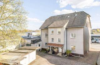 Mehrfamilienhaus kaufen in 44575 Castrop-Rauxel, Castrop-Rauxel - Vielseitiges Dreifamilienhaus mit großem Grundstück und 4 Garagen