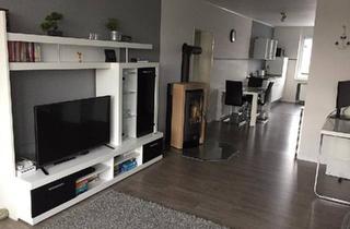 Wohnung kaufen in 52382 Niederzier, Niederzier - Helle, moderne 3-Zimmer-Eigentumswohnung mit Balkon & Kaminofen