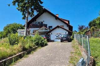 Haus kaufen in 63543 Neuberg, Neuberg - 3-Familienhaus mit Ausbaupotenzial, Garten & Garage in Neuberg-Rü