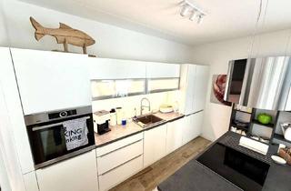 Wohnung kaufen in 29549 Bad Bevensen, Moderne 115 m² Wohnung (Baujahr 2020) mit Terrasse, Aufzug & TG - Energieklasse A+
