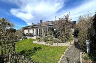 Haus kaufen in 49492 Westerkappeln, Traumbungalow in ruhiger Lage - Wintergarten, Kamin, PV-Anlage & Gartenparadies in Westerkappeln