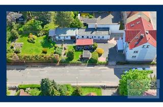 Mehrfamilienhaus kaufen in 04564 Böhlen, Viel Raum für Ihre Visionen: Gepflegtes Mehrfamilienhaus mit Baugrundstück und weitläufigem Garten