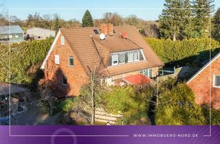 Doppelhaushälfte kaufen in 24616 Sarlhusen, Frei ab Sommer 2026! Doppelhaushäfte mit wohnlichem Souterrain