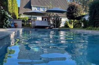 Einfamilienhaus kaufen in 33397 Rietberg, Wohnkomfort trifft Lebensqualität – Attraktives Einfamilienhaus mit Pool und Traumgarten in Rietberg
