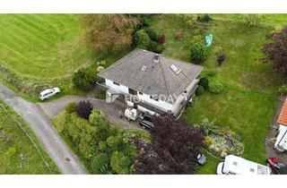 Einfamilienhaus kaufen in 36129 Gersfeld, Attraktives Einfamilienhaus mit Einlieger-Fewo, Hanglage, Doppelgarage & großem Grundstück