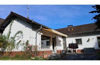 Haus kaufen in 63594 Hasselroth, Freistehender Winkelbungalow am Waldrand | 5 Zimmer | großes Grundstück | vielseitig nutzbar