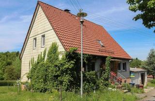 Einfamilienhaus kaufen in 71543 Wüstenrot, Wüstenrot - Charmantes Einfamilienhaus mit großen Garten, 2 Garagen und einem Freistellplatz