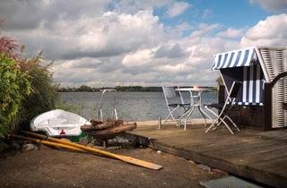 Haus kaufen in 17192 Waren, Waren (Müritz) - Zwei Holzhäuser direkt am See mit Privatstrand