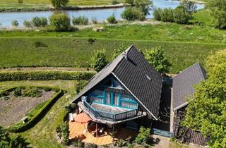 Haus kaufen in 25569 Kremperheide, Kremperheide - Holzhaus mit großem Nebengebäude am Fluss in fast Alleinlage