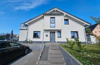 Doppelhaushälfte kaufen in 63691 Ranstadt, Ranstadt - Modernes Familienhaus mit Garten, Homeoffice & Feldblick