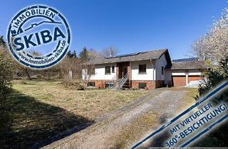 Haus kaufen in 54579 Üxheim, Üxheim-Niederehe - Weitläufiges Grundstück am Ortsrand: Bungalow mit Doppelgarage