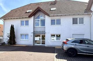 Wohnung kaufen in 63486 Bruchköbel, Kapitalanlage: 2-Zimmer-DG-Wohnung mit Balkon, 2 Stellplätzen & Keller in B