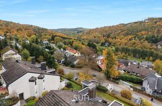 Wohnung kaufen in 61389 Schmitten, TAUNUS-FEELING – 3,5-Zimmer mit TRAUM-AUSSICHT und Garten-Terrasse in Schmitten