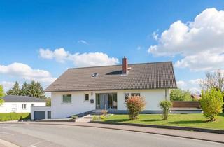 Einfamilienhaus kaufen in 35415 Pohlheim, Familienparadies in Feldrandlage - Einfamilienhaus mit Einliegerwohnung und großem Garten.