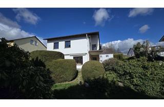 Einfamilienhaus kaufen in 61381 Friedrichsdorf, Charmantes Einfamilienhaus mit großem Potenzial auf sonnigem Südgrundstück