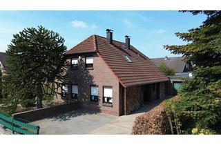 Haus kaufen in 26316 Varel, Großzügiges Familienparadies: 6 Zimmer, Wintergarten & idyllischer Garten in Varel