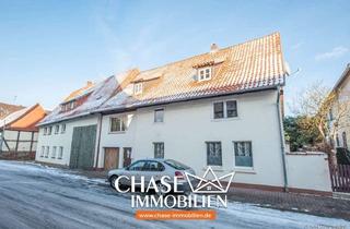 Haus kaufen in 37434 Rollshausen, 2x Einfamilienhäuser mit Entwicklungspotenzial – Teilvermietete Kapitalanlage in Rollshausen!