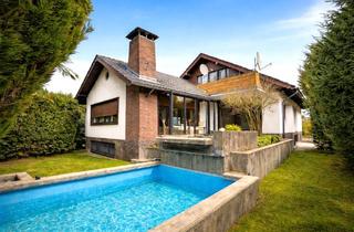 Einfamilienhaus kaufen in 38154 Königslutter, Großzügiges Luxus-Einfamilienhaus in begehrter Lage mit Pool, Wintergarten & Einliegeroption