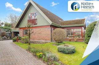 Einfamilienhaus kaufen in 24582 Brügge, Charmantes Einfamilienhaus mit großem Wintergarten im Ortskern von Brügge