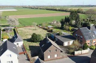 Grundstück zu kaufen in 41542 Dormagen, Seltene Gelegenheit: Feldrandgrundstück mit Potenzial und Möglichkeiten