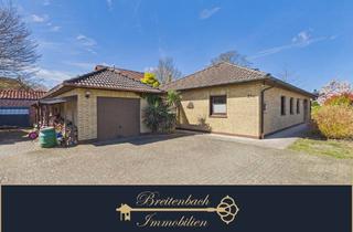 Haus kaufen in 27751 Delmenhorst, Delmenhorst - Delmenhorst - SchafkovenDonneresch . Charmanter Bungalow mit idyllischem Garten in ruhiger Wohnlage