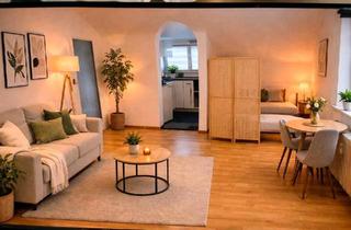 Wohnung kaufen in 79110 Freiburg, Freiburg im Breisgau - Dachgeschosswohnung mit Schlossblick in Badenweiler - frei