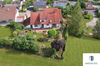 Wohnung kaufen in 55452 Windesheim, Wohnen wie im eigenen Haus: 4,5 Zimmer mit Garten, Doppelarage und unverbaubarem Blick in Windesheim