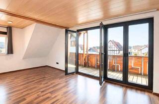 Wohnung kaufen in 63584 Gründau, Fast wie ein eigenes Haus – charmante Maisonette-Wohnung mit Kamin, Balkon & Dachstudio