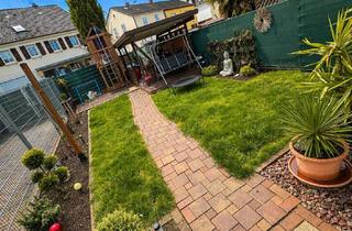Wohnung kaufen in Rheingönheimer Straße, 67122 Altrip, Charmante Wohnung mit Garten , Stellplätzen in zentraler Lage