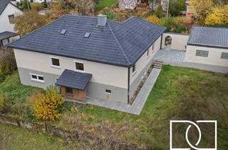 Haus kaufen in 91077 Neunkirchen, Traumlage! Teilrenovierter Bungalow mit separater ELW, großem Garten und Doppelgarage