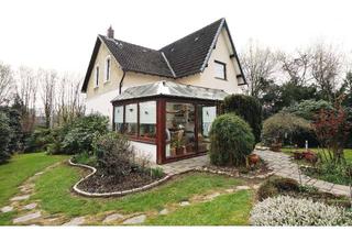 Villa kaufen in 51375 Schlebusch, Stilvolle Villa in Leverkusen-Schlebusch mit grünem Grundstück und Wintergarten