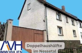 Doppelhaushälfte kaufen in 99869 Hochheim, gemütliche Doppelhaushälfte mit zwei Garagen, Scheune und Garten im Nessetal Landkreis Gotha