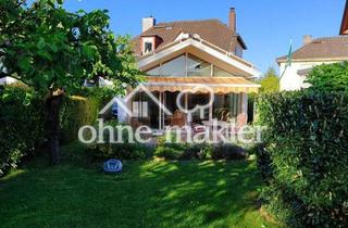 Einfamilienhaus kaufen in 65824 Schwalbach, Ansprechendes Zuhause für Gartenfans