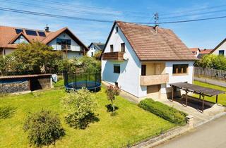 Haus kaufen in 97461 Hofheim, Raum für eigene Wohnideen! Ruhig und sonnig gelegenes Haus mit zwei Balkone, Garage, Carport, Wohn