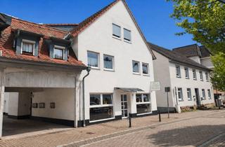 Wohnung kaufen in 64521 Groß-Gerau, Kapitalanlage mit Perspektive – Vermietete Dachgeschosswohnung in zentraler Bestlage von Groß-Gerau